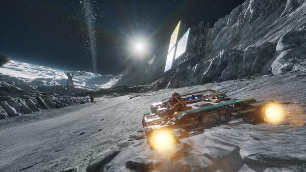 Screenshot from STAR WARS: Galactic Racer™ showing a speeder racing across a rocky moonlit terrain with bright engine trails.