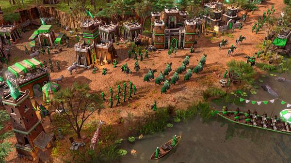Screenshot from Age of Empires III: Definitive Edition - The African Royals, showing an African settlement with soldiers and boats by a river.
