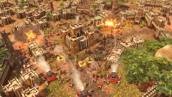 Screenshot from Age of Empires III: Definitive Edition - The African Royals showing a battle in a detailed African village setting.