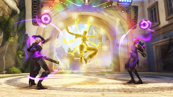 Overwatch® screenshot: Two heroes, Moira and Zenyatta, engage in battle in a vibrant arena, surrounded by colorful lights and energy.