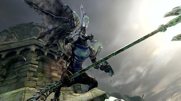 A screenshot from DARK SOULS™: REMASTERED shows a dragon-like creature wielding a large spear against a cloudy sky backdrop.