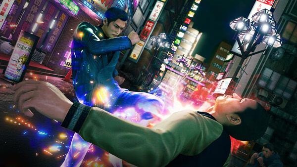 Screenshot from Yakuza Kiwami 3 & Dark Ties showing a dynamic street fight with glowing effects in a bustling city setting.