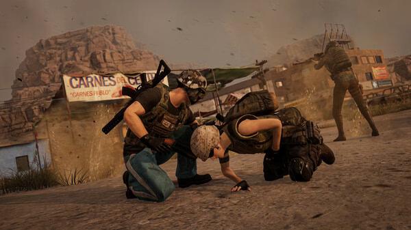 PUBG: BATTLEGROUNDS screenshot: A player in tactical gear revives a teammate on a dusty road, while another player stands guard nearby.
