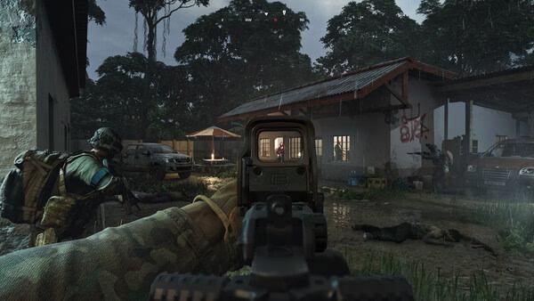 Screenshot from Gray Zone Warfare showing a player aiming through a scope in a rain-soaked jungle village, with soldiers and vehicles visible.