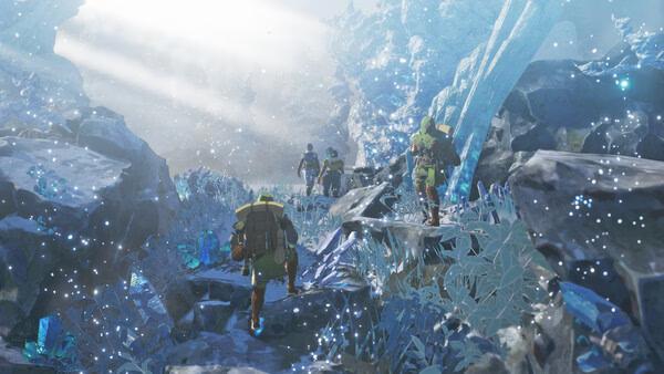 Screenshot from Monster Hunter Stories 3: Twisted Reflection showing hunters trekking through a sparkling, icy cave.