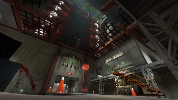 Team Fortress 2 screenshot showing an industrial area with metal beams, orange cones, and a glowing red exit sign above a doorway.