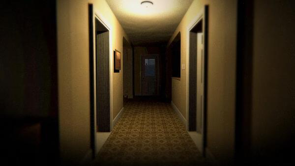 Screenshot from Phasmophobia showing a dimly lit hallway with closed doors and patterned carpet, creating a tense atmosphere.