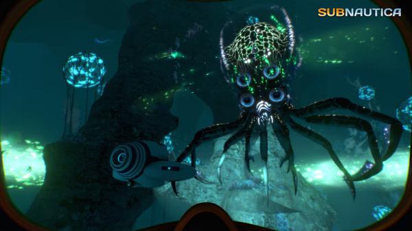 Subnautica screenshot: A diver encounters a large, glowing creature in an underwater cavern filled with bioluminescent flora.