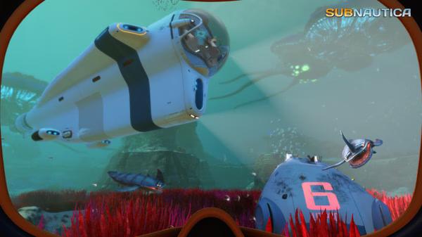 Subnautica screenshot showing a submerged vehicle exploring a vibrant underwater landscape with alien creatures and coral.