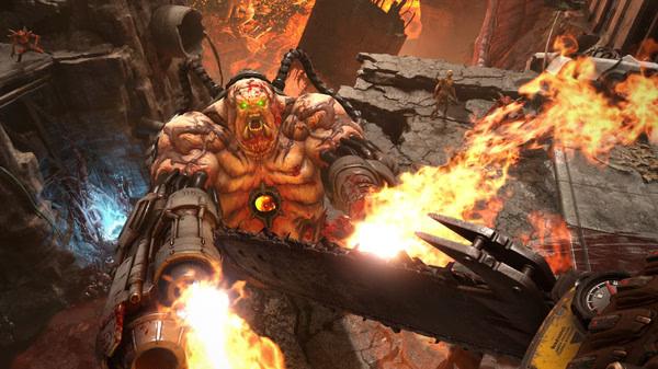 DOOM Eternal screenshot: A fierce battle with a massive demon as the Doom Slayer wields a chainsaw amid fiery chaos.