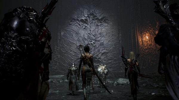 Screenshot from Chrono Odyssey showing a group of characters approaching a large, intricate stone door in a dimly lit environment.