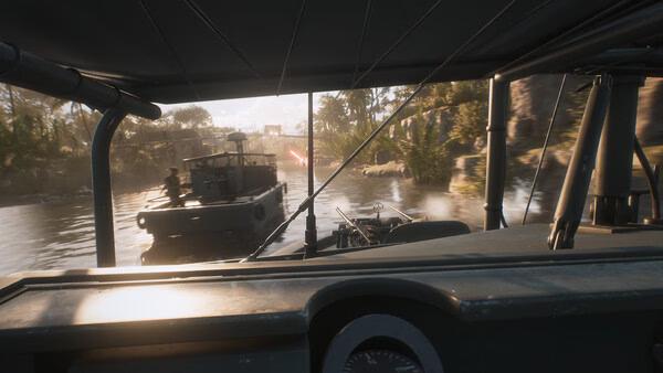 Screenshot of "Hell Let Loose: Vietnam" showing two military boats navigating a river, with distant gunfire visible.