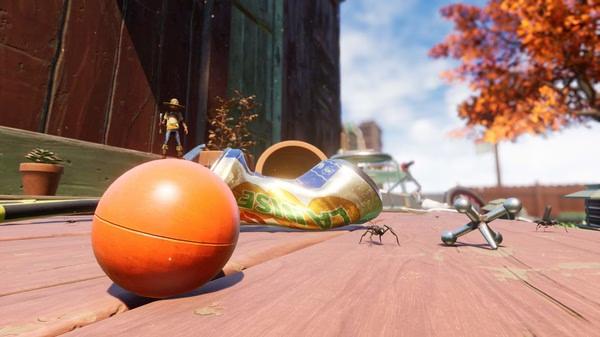 Grounded screenshot: A tiny character stands on a wooden surface, surrounded by ants, a toy ball, and a soda can.