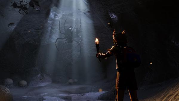 Grounded screenshot: A character with a torch approaches a giant spider in a dark, web-filled cave, illuminated by beams of light.