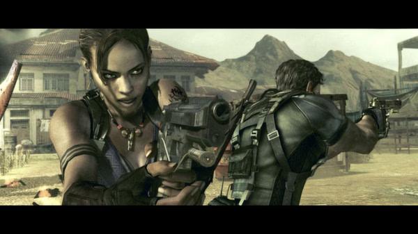 Resident Evil 5 screenshot: Two characters armed and ready in a dusty village setting with mountains in the background.