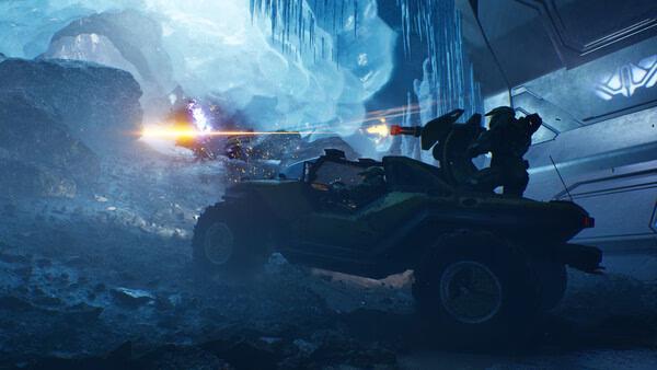 Halo: Campaign Evolved screenshot featuring a vehicle in icy terrain, firing at an enemy with glowing projectiles.