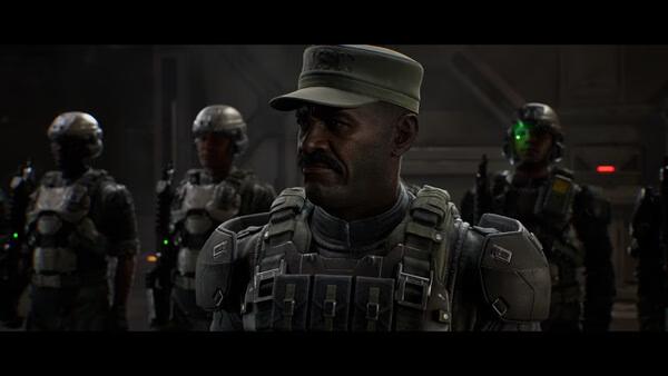 Halo: Campaign Evolved screenshot showing a group of armored soldiers standing in a dimly lit futuristic setting.
