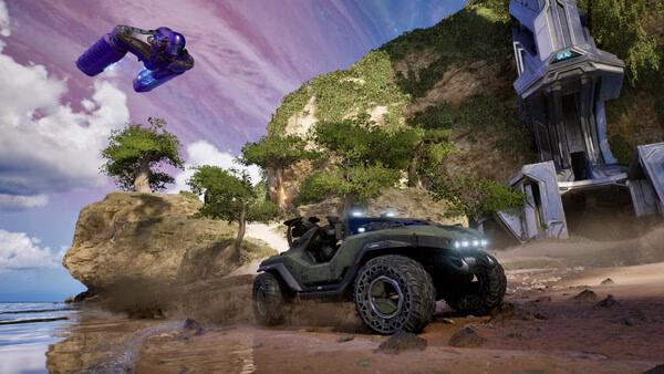 Halo: Campaign Evolved screenshot featuring a Warthog vehicle on a beach, with a purple alien ship hovering above.