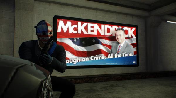 PAYDAY 2 screenshot: A masked character crouches with a weapon in front of a McKendrick campaign billboard in a dimly lit area.