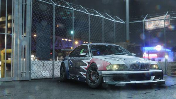 Screenshot from Need for Speed Unbound showing a customized car parked near a chain-link fence at night with neon lights in the background.