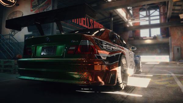 Need for Speed Unbound screenshot: A customized sports car with decals parked inside a sunlit garage.