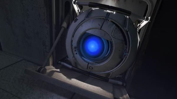 Portal 2 screenshot showing Wheatley, a white spherical robot with a glowing blue eye, positioned in a dimly lit industrial area.