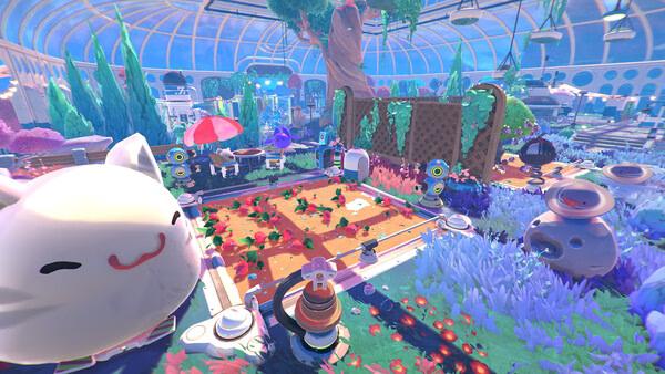 Screenshot from Slime Rancher 2 showing a vibrant garden with slimes, plants, and trees under a large glass dome.