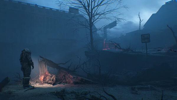 Cronos: The New Dawn screenshot showing a lone astronaut standing by a glowing campfire in a dark, desolate landscape.