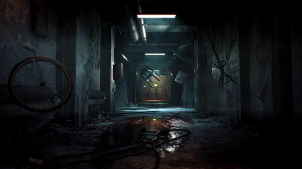 Screenshot from Cronos: The New Dawn showing a dimly lit, eerie corridor with scattered debris and a bicycle wheel on the wall.