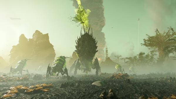HELLDIVERS 2 screenshot: A group of alien creatures with glowing green accents advance across a foggy, rocky landscape.