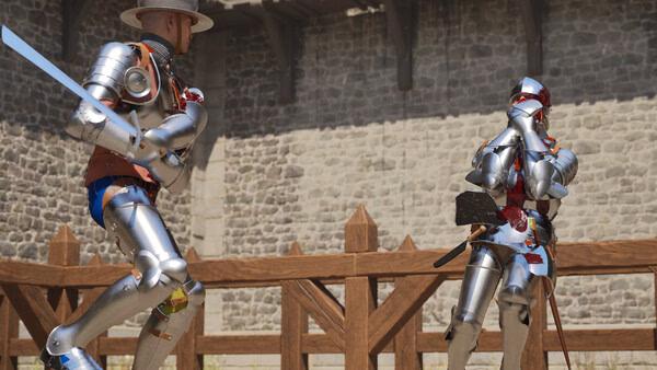 Two armored fighters duel with swords in a medieval arena in this Half Sword screenshot. Stone walls and wooden fencing surround them.