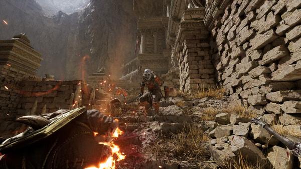 Screenshot from Fatekeeper: A knight in armor stands amidst ancient ruins, surrounded by flames and broken stone walls.