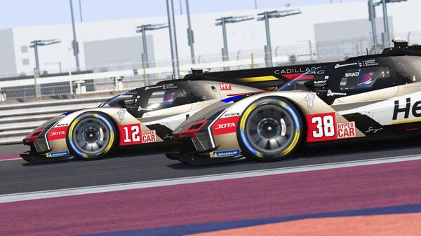 Le Mans Ultimate screenshot: Two hypercars, #12 and #38, race side by side on a vibrant track with buildings in the background.