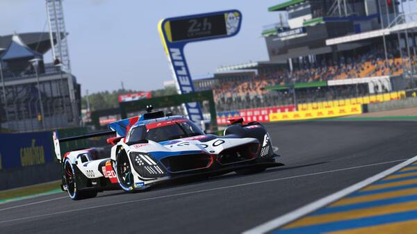 A Le Mans Ultimate screenshot showing a racing car speeding on the iconic Circuit de la Sarthe track under bright daylight.