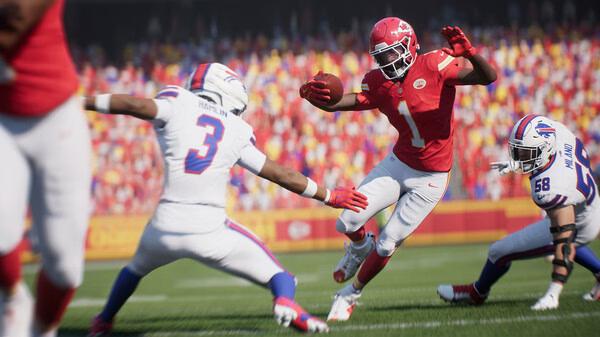 EA SPORTS Madden NFL 26 screenshot: A player in a red uniform dodges defenders during a tense football match on the field.