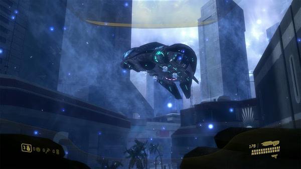 Screenshot from Halo: The Master Chief Collection showing a futuristic cityscape with a hovering alien spacecraft.