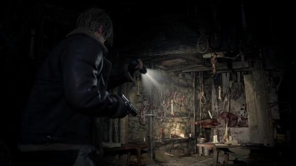 A character in a leather jacket explores a dimly lit, eerie room with hanging objects in a 'Resident Evil 4 Remake' screenshot.