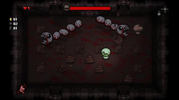Screenshot from The Binding of Isaac: Rebirth showing Isaac facing off against a segmented worm-like enemy in a dark dungeon.