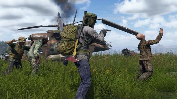 DayZ screenshot: Survivors in a grassy field near a crashed helicopter, one aiming a weapon while another raises their hands in surrender.