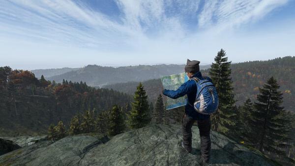DayZ screenshot: A character with a backpack holds a map, standing on a rocky cliff overlooking a vast forest landscape.