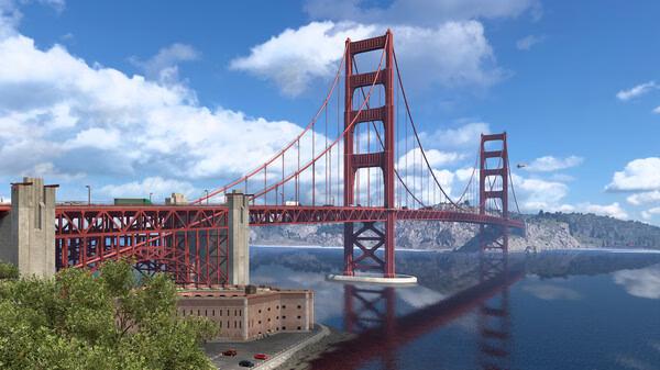 American Truck Simulator screenshot showing the iconic Golden Gate Bridge spanning a calm bay under a bright blue sky.