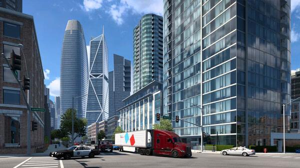 A screenshot from American Truck Simulator showing a red truck hauling cargo through a busy urban street with tall modern buildings.