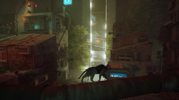 Screenshot from the game Stray: A cat walks along a pipe in a futuristic cityscape illuminated by neon lights and signs.