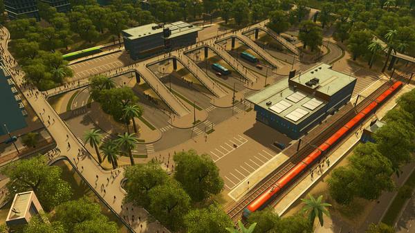 Screenshot from Cities: Skylines showing a bustling bus and train station surrounded by trees and pedestrians.
