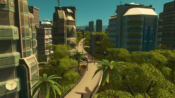 Cities: Skylines screenshot showing a sunny cityscape with modern buildings, lush trees, and a pedestrian pathway.