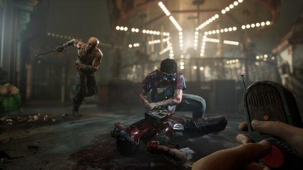 Screenshot from The Outlast Trials: A tense scene shows two figures looming over a fallen character in a dark, eerie environment.