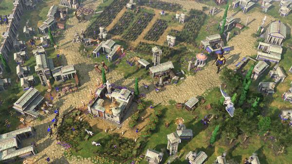 Aerial view screenshot of a bustling ancient city with temples and pathways in Age of Mythology: Retold.