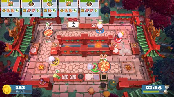 Overcooked! 2 screenshot: Four chefs frantically prepare dishes in a vibrant outdoor kitchen with multiple serving areas.