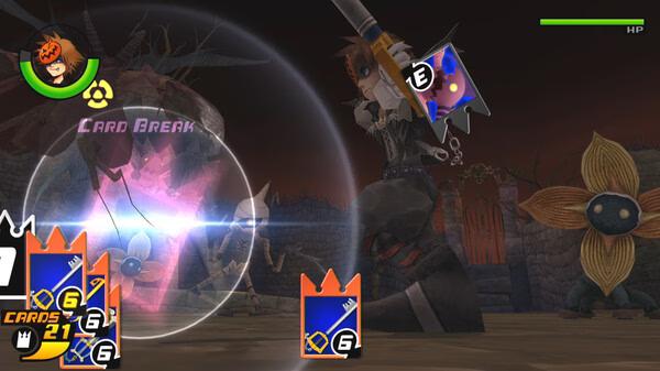 Screenshot from KINGDOM HEARTS -HD 1.5+2.5 ReMIX showing Sora battling Heartless with cards visible in the foreground.