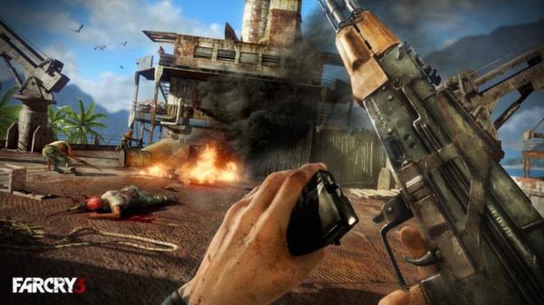 Far Cry 3 screenshot: A player holds a weapon and grenade, with explosions and fallen enemies on an industrial island setting.